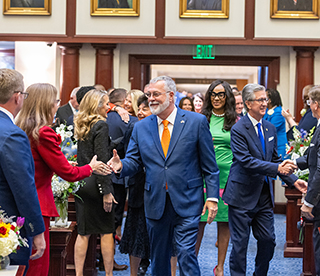 President Albritton enters the Senate Chamber